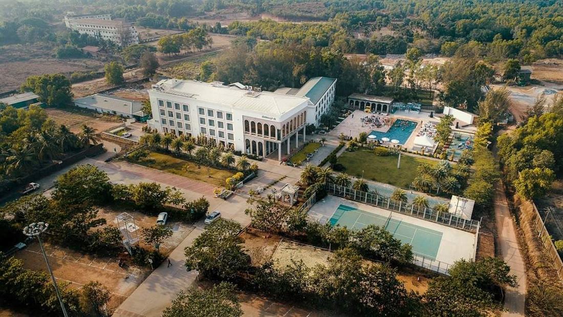 Pool, courts and gardens from the air