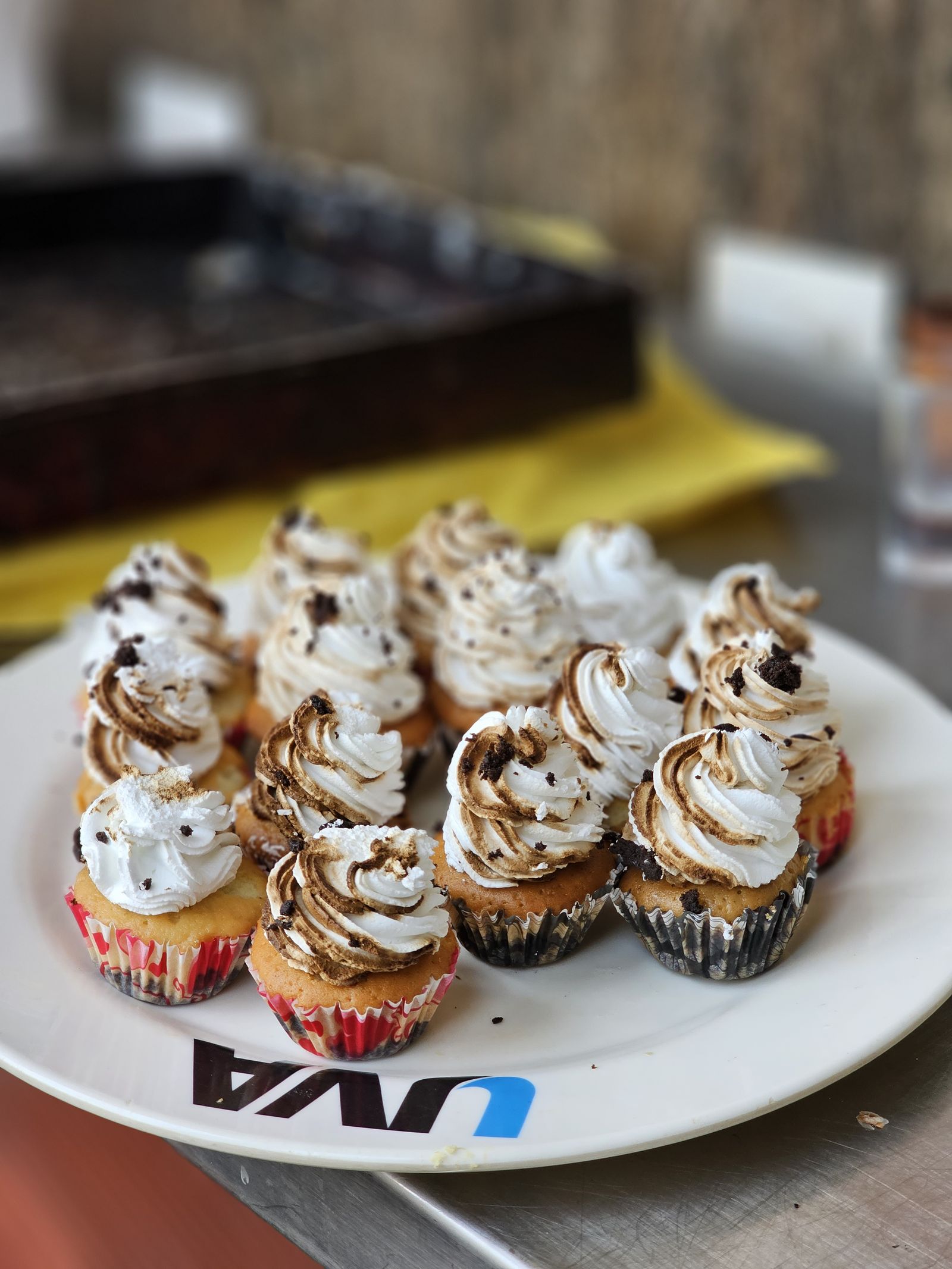Cupcakes on a UVA Meridian branded plate at Brownies bakery