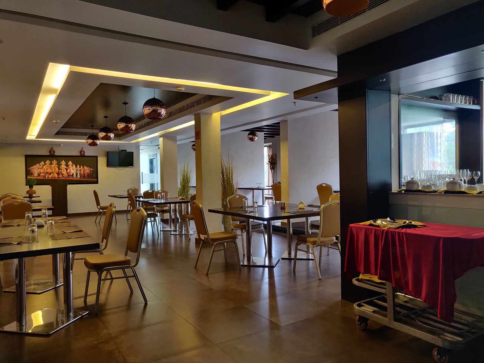 Warm interior of Coastal Curry restaurant at UVA Meridian