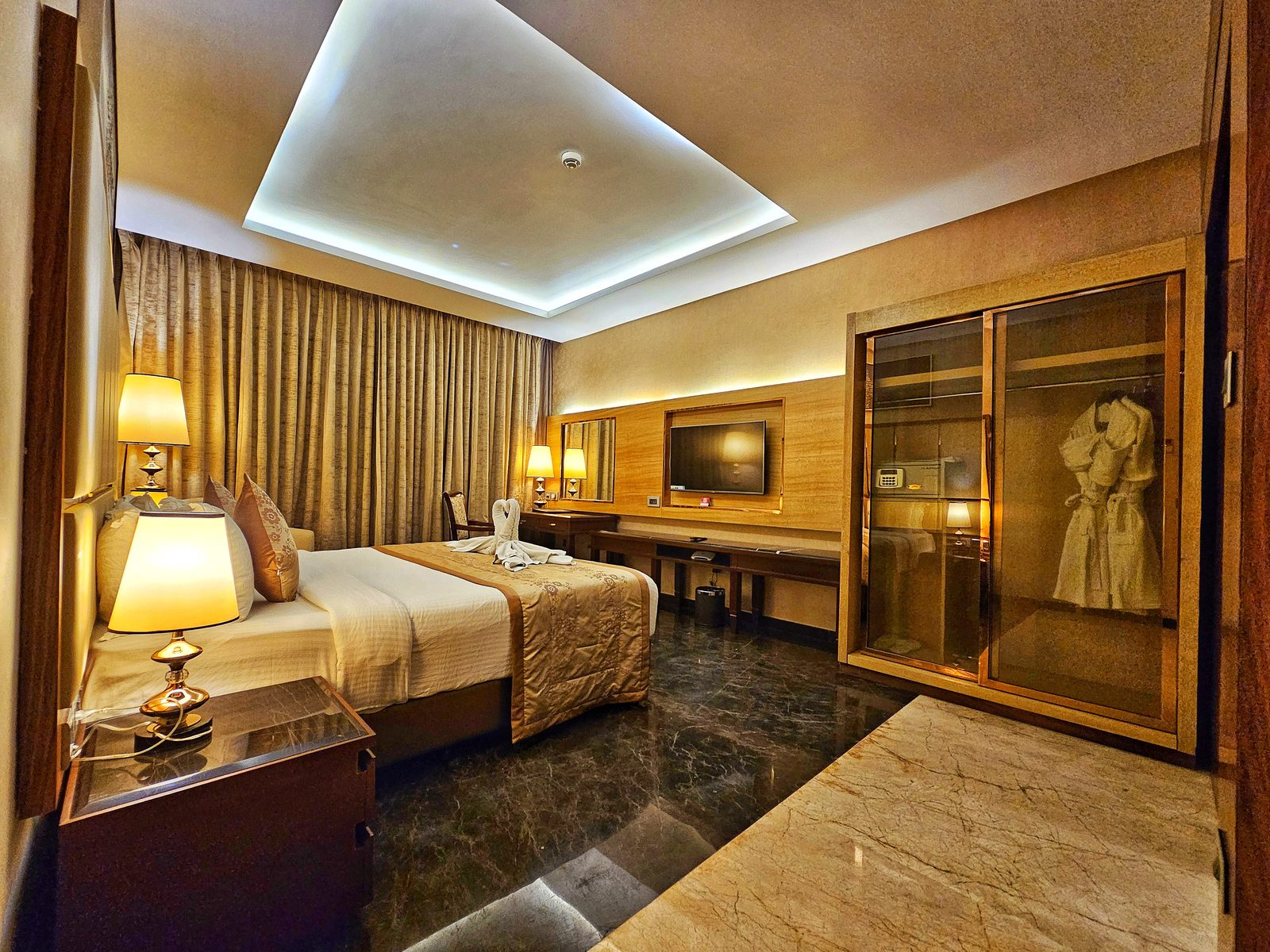 Suite Room bed and wardrobe at UVA Meridian
