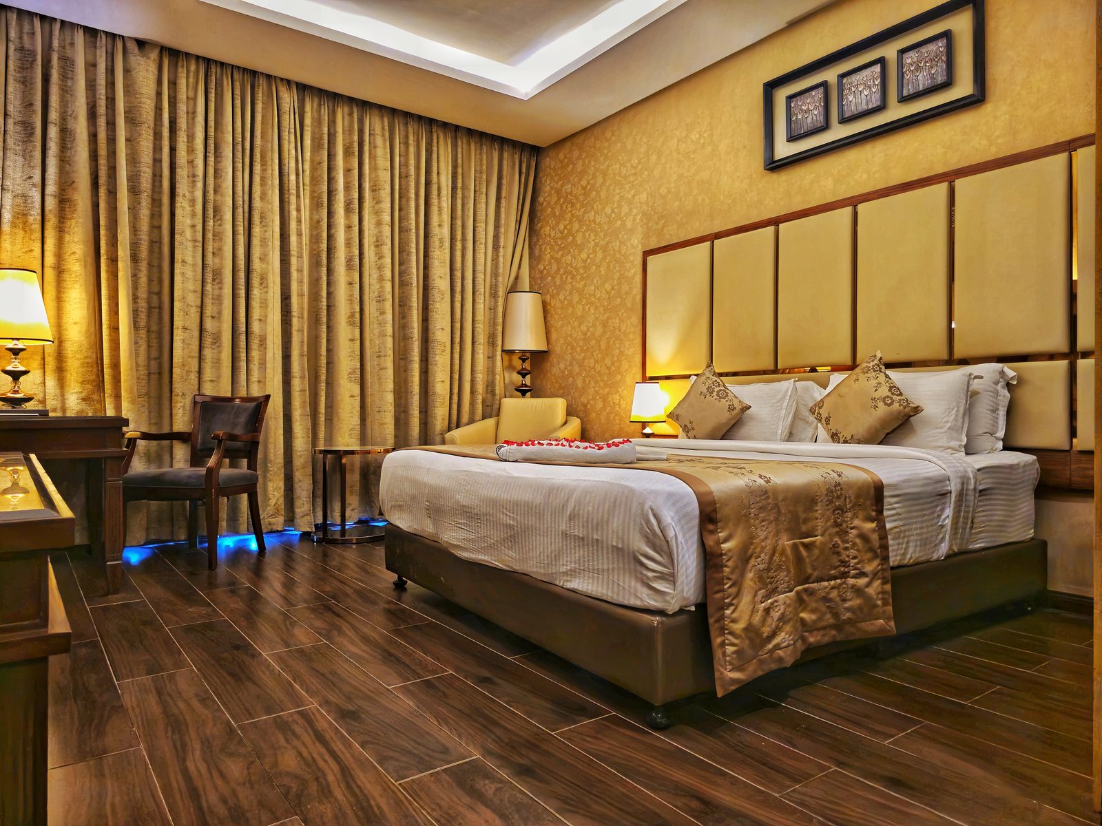 Superior Room bed and curtains at UVA Meridian